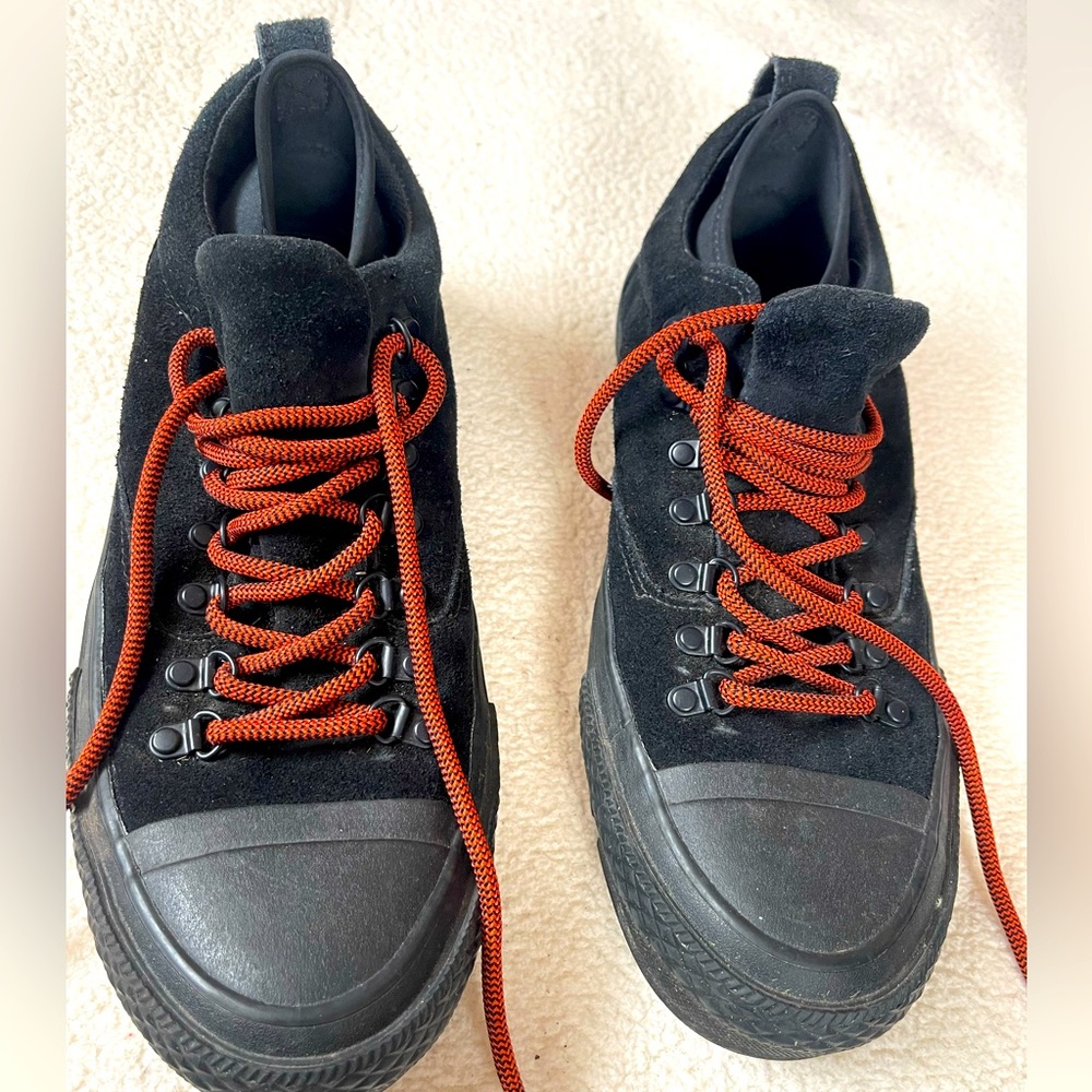 Converse rubber lined sneaker.